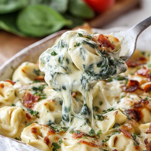 Delish Cheesy Tortellini Spinach Bake